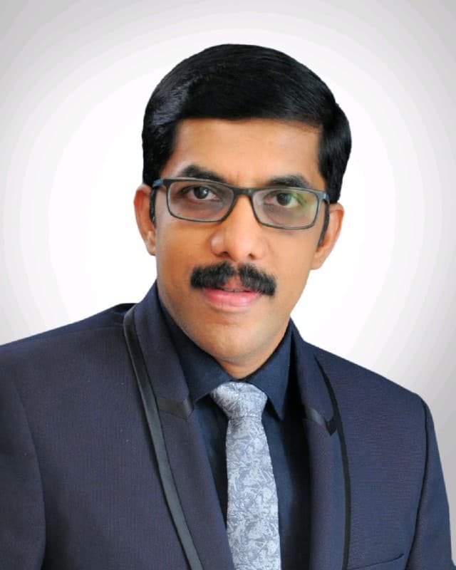 DR. K. P. SURAJ
